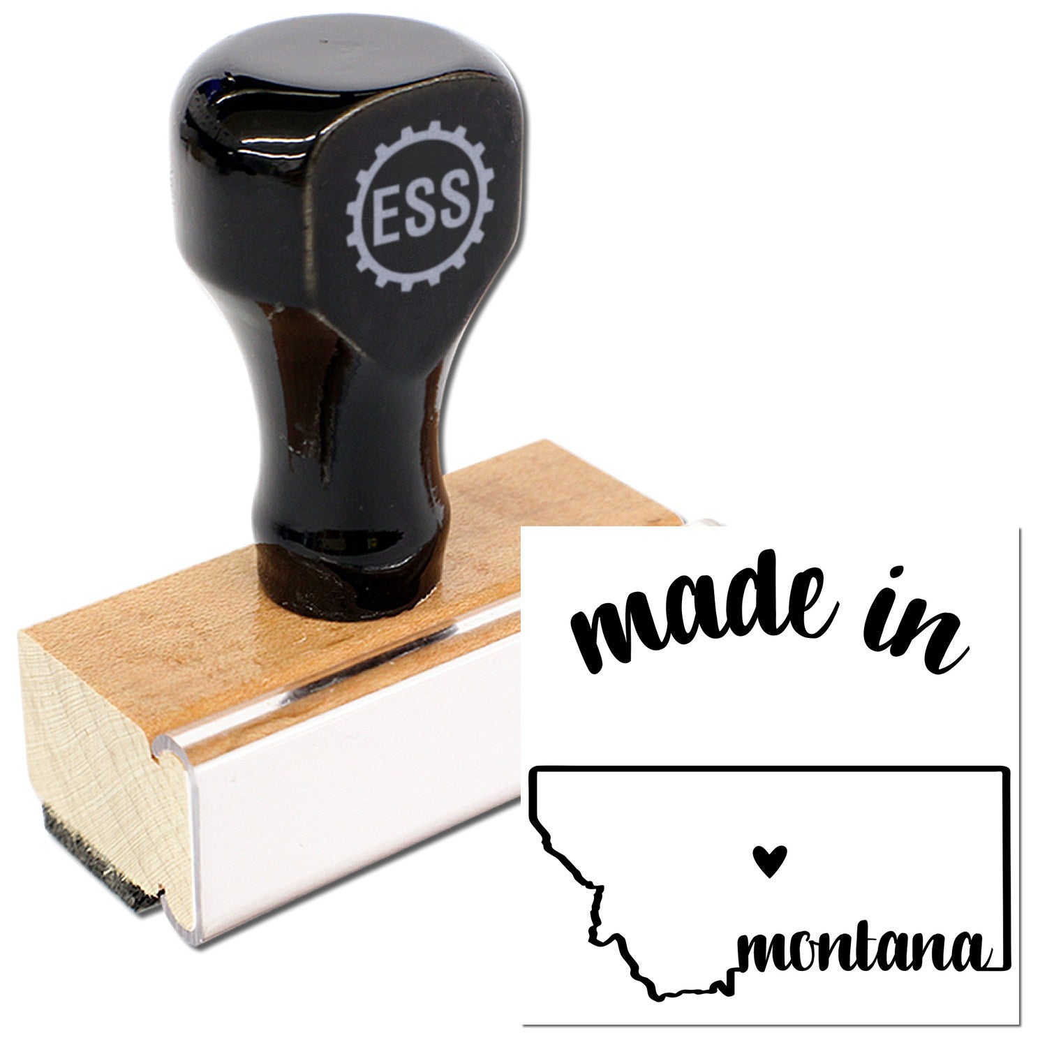 Made with Love in Montana Rubber Stamp featuring a wooden handle and black rubber design, showcasing the phrase 'made in montana' with a heart and state outline. Perfect for crafts.