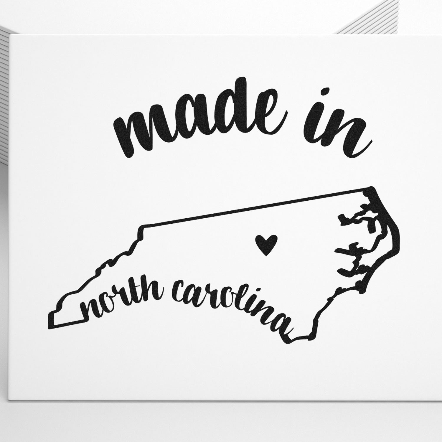 Self-Inking Handmade with Love in North Carolina Stamp featuring a map outline and heart, perfect for crafts and gifts.