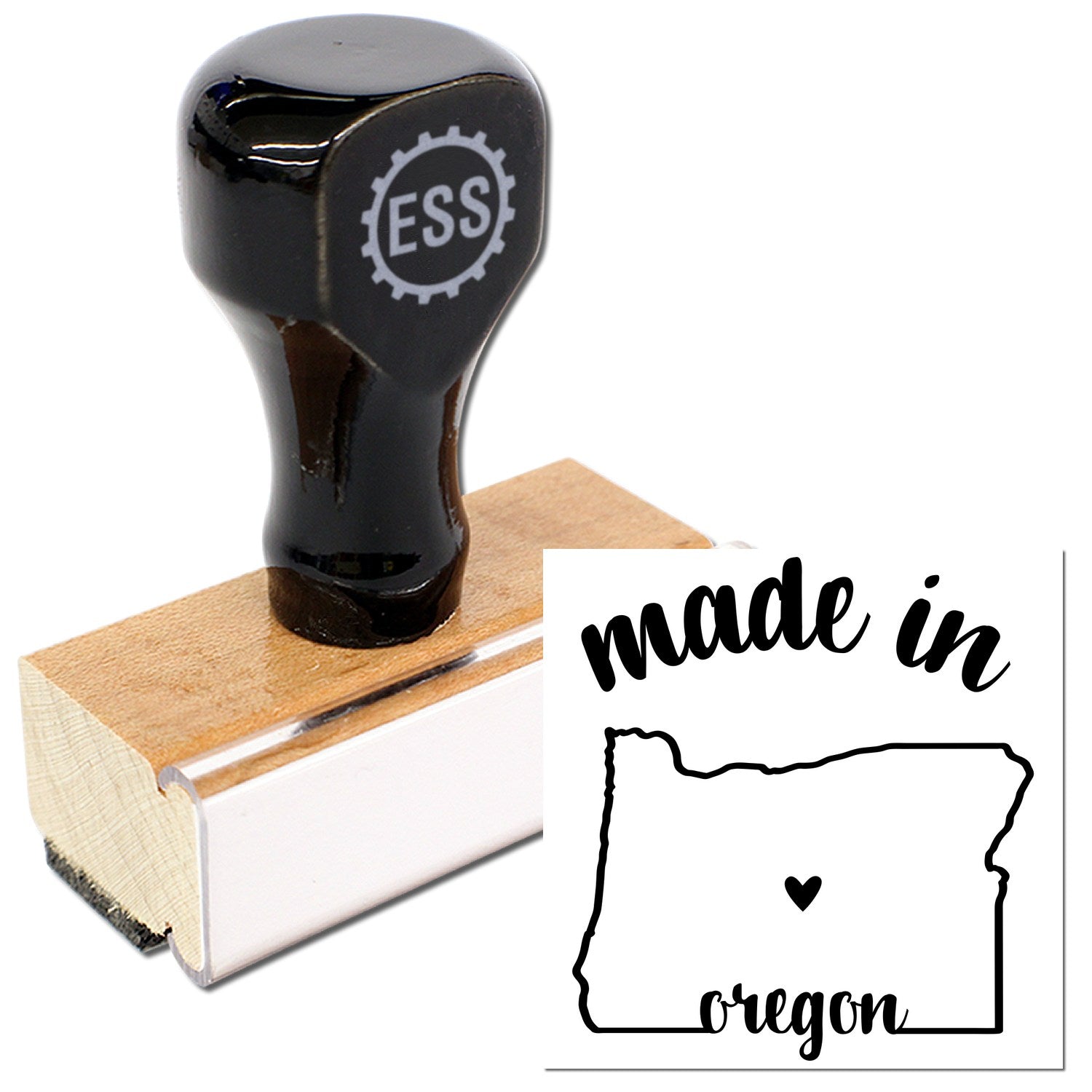 Made with Love in Oregon Rubber Stamp featuring a wooden handle and black rubber design, showcasing the phrase 'made in Oregon' with a heart inside the state outline.