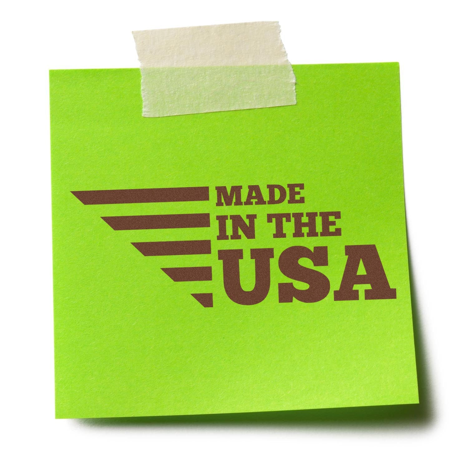 Wood Handle Patriotic and Proud Rubber Stamp on green paper, displaying Made in the USA text. Perfect for crafts and stationery, showcasing American pride with a classic wooden handle design.