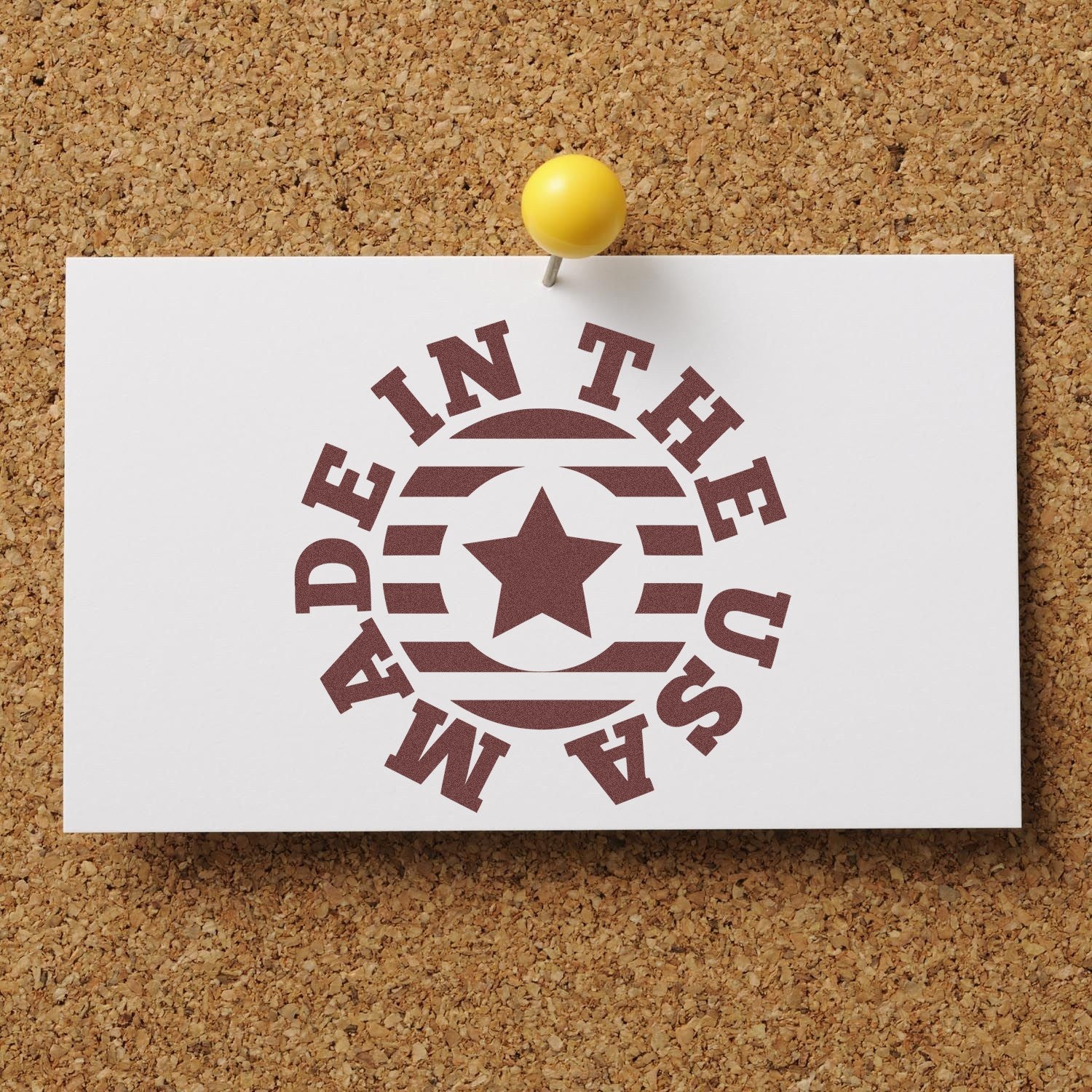 PSI Pre-Inked Made In The USA Star Emblem Stamp on corkboard, showcasing a circular design with a central star and bold text, ideal for patriotic branding and crafts.