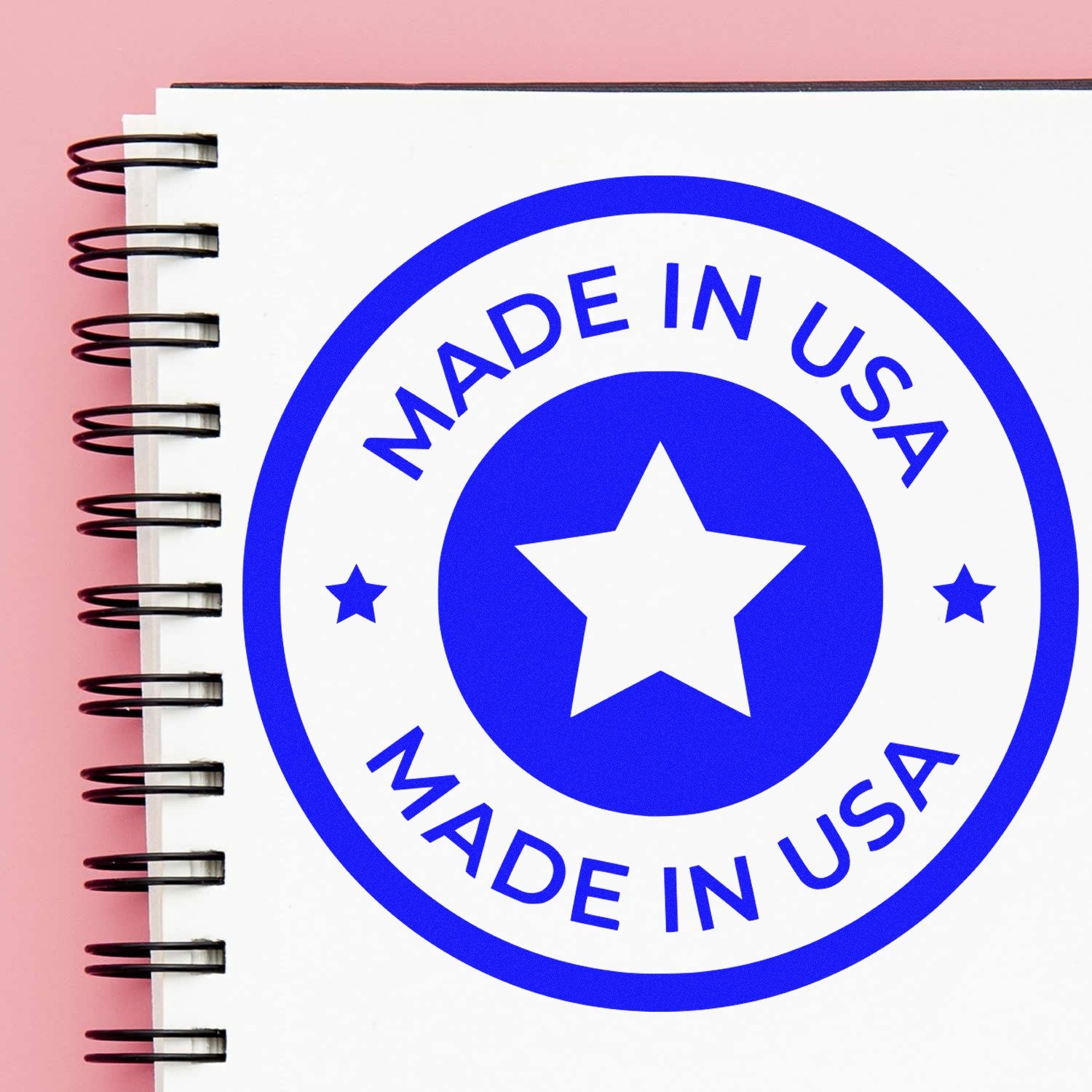 Wood Handle Our Country Craftsmanship Seal Rubber Stamp imprint on paper, featuring a blue 'Made in USA' design with a star, showcasing quality craftsmanship.