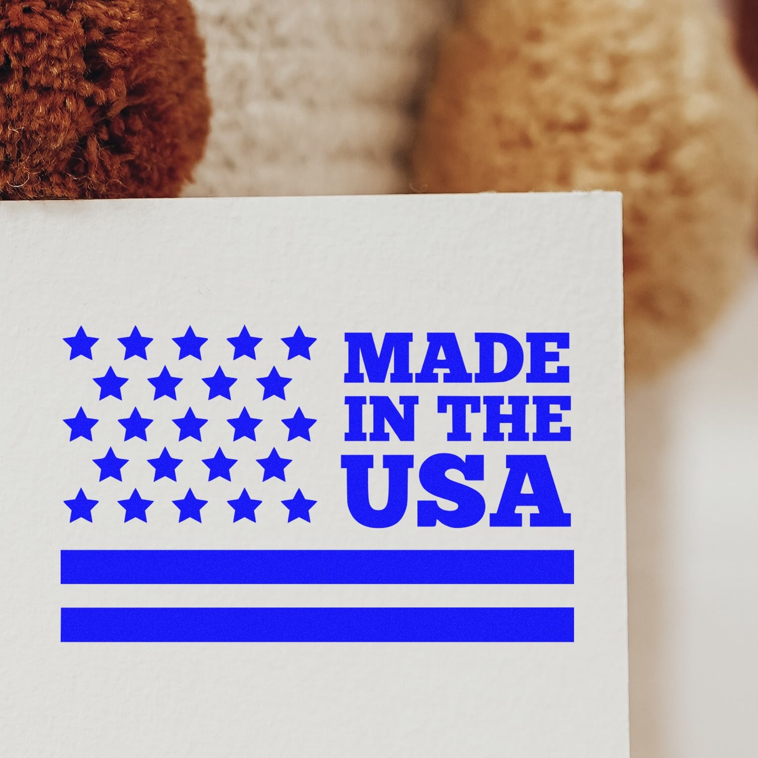 Self-Inking Patriot Pride Stamp Stamp featuring a blue 'Made in the USA' design with stars and stripes, perfect for adding a patriotic touch to documents and crafts.