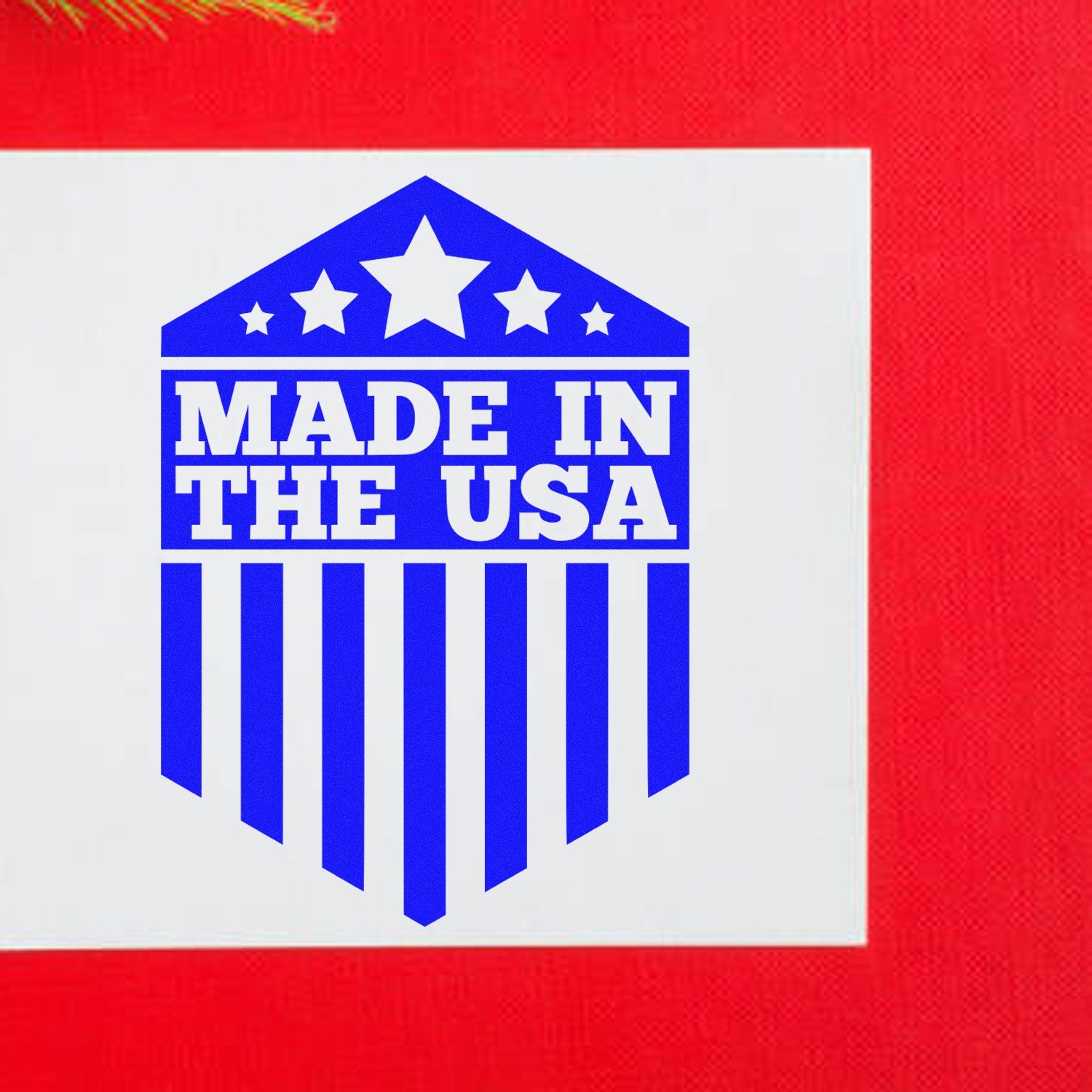 Wood Handle Patriotic Pride Seal Rubber Stamp featuring a Made in the USA design with stars and stripes, displayed on a red background. Perfect for adding a patriotic touch to crafts.