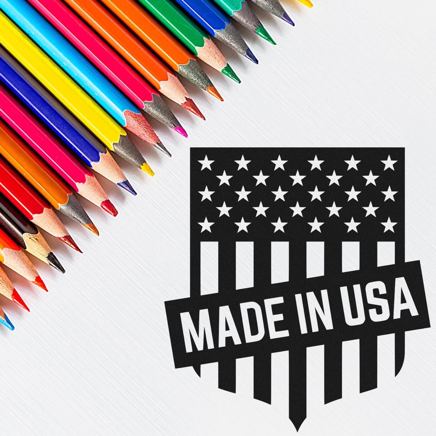 Self-Inking Patriotic Seal Of Quality Stamp with 'Made in USA' design, featuring stars and stripes, next to colorful pencils on a white background.