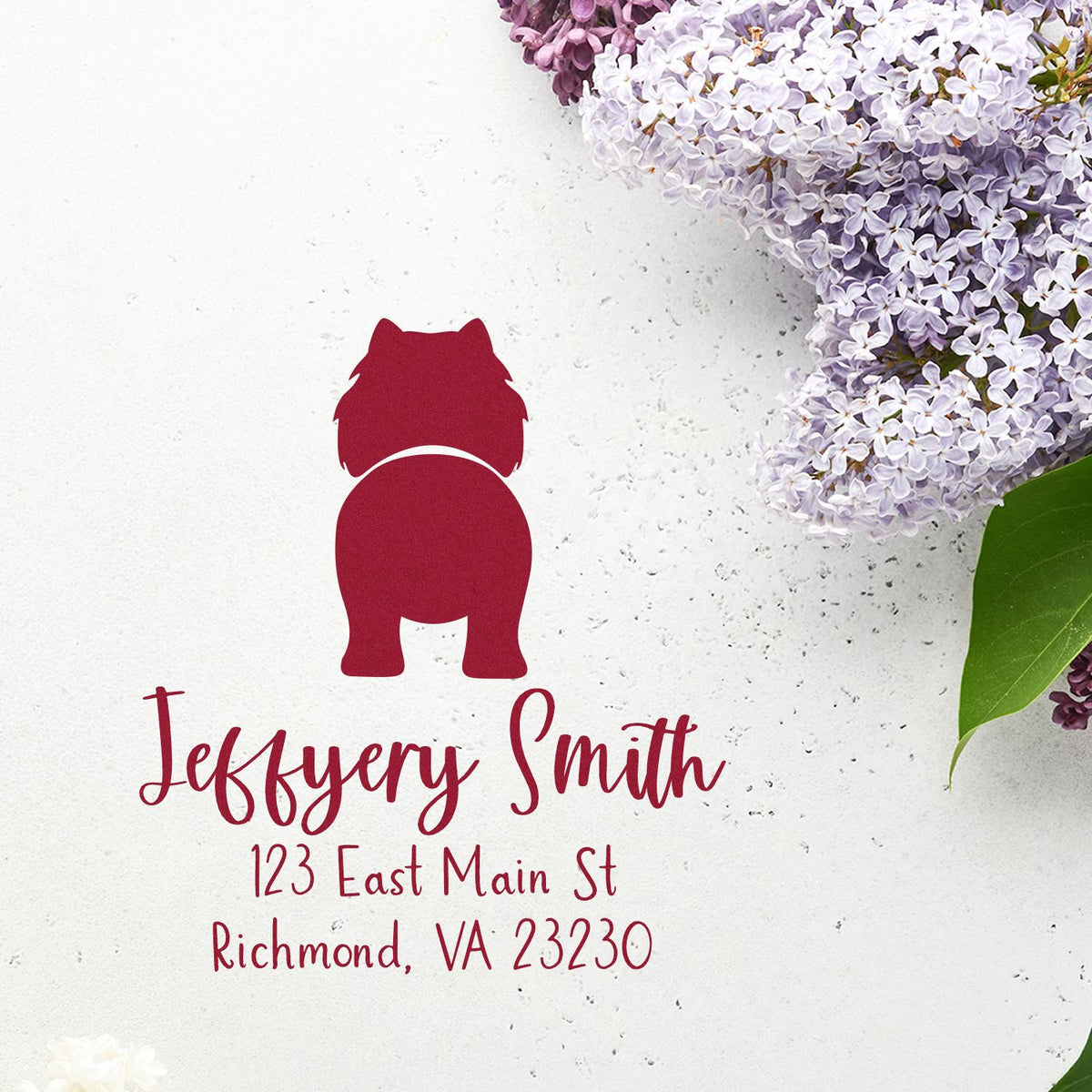 Burgundy personalized address stamp and seal with animal silhouette, Jeffery Smith, Richmond VA, on lilac floral background.