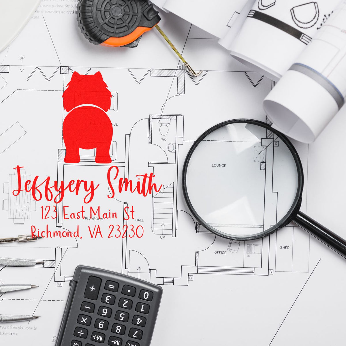 Red custom stamp and seal on architectural blueprint, with black tape measure, magnifying glass, and calculator.