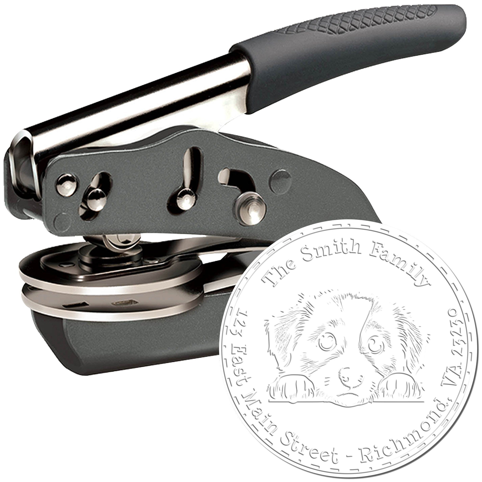 Black and silver handheld embossing stamp with custom round seal, dog illustration, and family name text.
