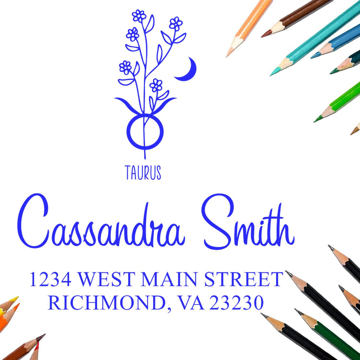 Blue Taurus floral custom stamp seal for Cassandra Smith with address, framed by colored pencils on white.