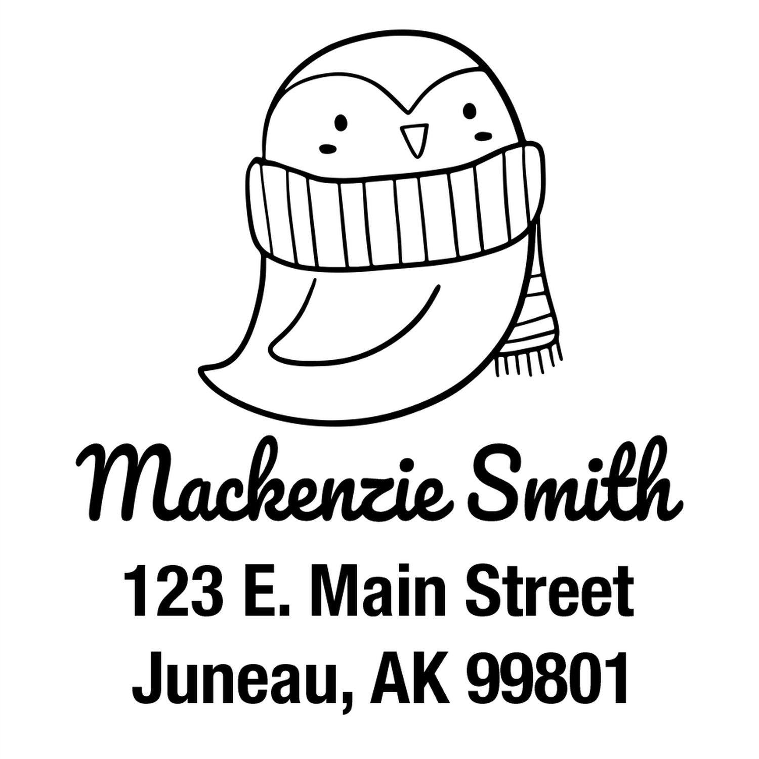 Self-Inking Cartoon Animal Pretty Penguin Custom Made Address Stamper featuring a cute penguin wearing a scarf. Text reads "Mackenzie Smith, 123 E. Main Street, Juneau, AK 99801." Customizable Address Stamper for personalizing mail.