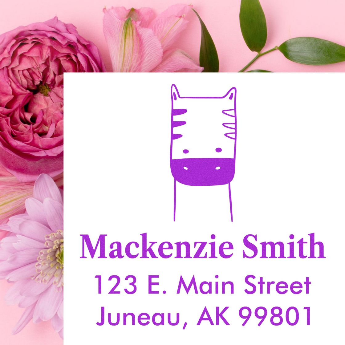 Personalized mailing stamp featuring a frolicsome zebra cartoon with a wood handle. The made-to-order envelope stamp displays the name Mackenzie Smith and address in purple, set against a floral background with pink flowers and green leaves.