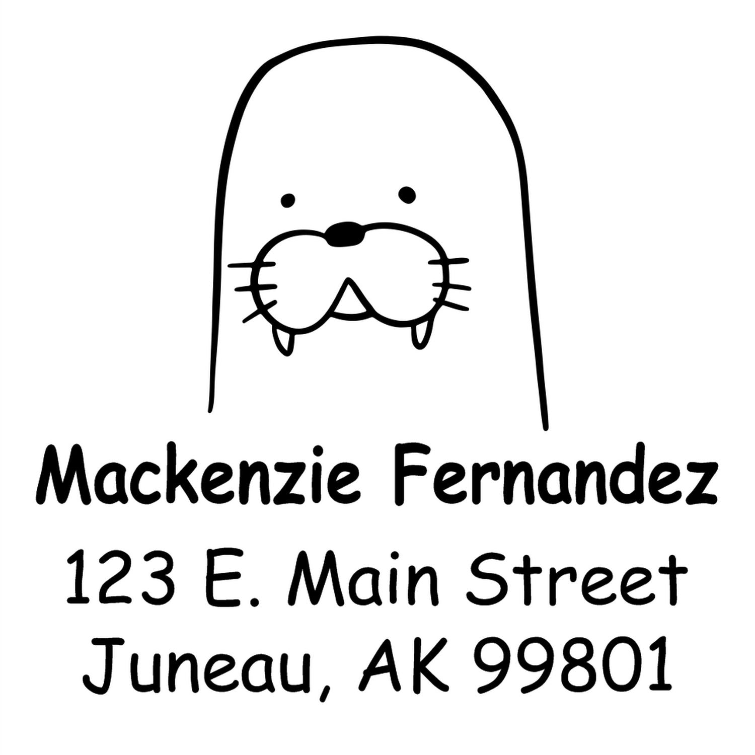 Wood Handle Wacky Walrus Cartoon Animal Made To Order Home Address Stamp featuring a walrus illustration above the text "Mackenzie Fernandez, 123 E. Main Street, Juneau, AK 99801." Custom New Address Stamper design with playful font.