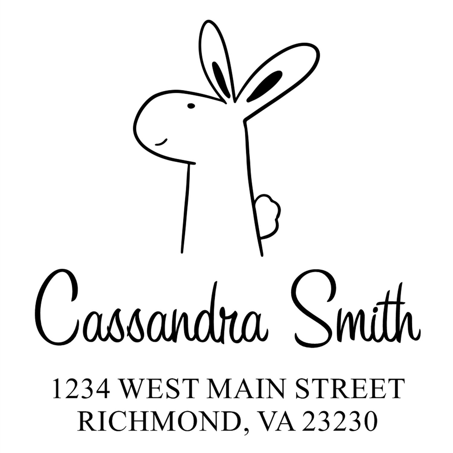 Wood Handle Bouncy Bunny Cartoon Animal Custom Return Address Stamp featuring a cute bunny illustration above the name "Cassandra Smith" and address "1234 West Main Street, Richmond, VA 23230." Ideal for a Customized Home Stamper.