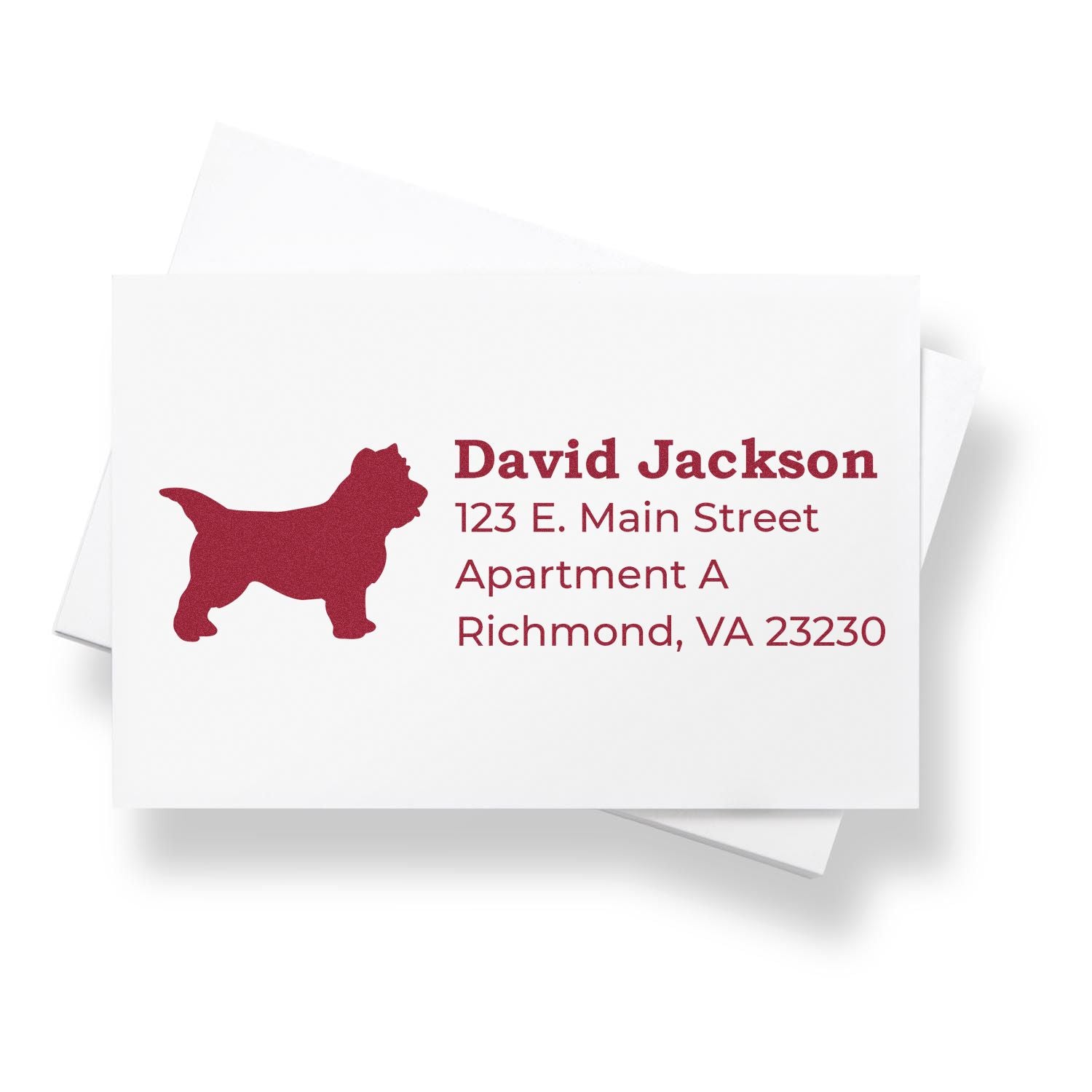 PSI Pre-Inked Personalized Cairn Terrier Address Stamp on white envelope, featuring a red silhouette of a Cairn Terrier and sample address text in bold red font.