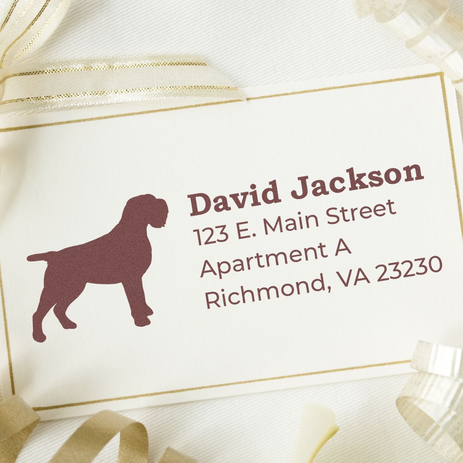 Self-Inking Wirehaired Pointing Griffon Dog Address Stamp on a card with a dog silhouette, address details, and decorative ribbons.