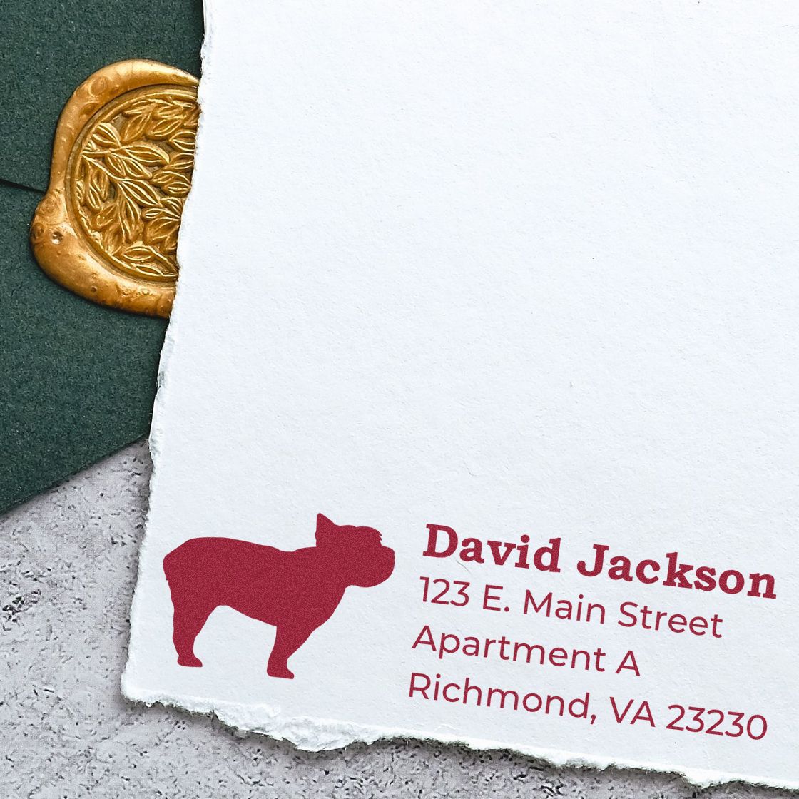 Self-Inking Yorkshire Terrier Dog Address Stamp on white paper with red text and a dog silhouette, next to a green envelope with a gold wax seal.