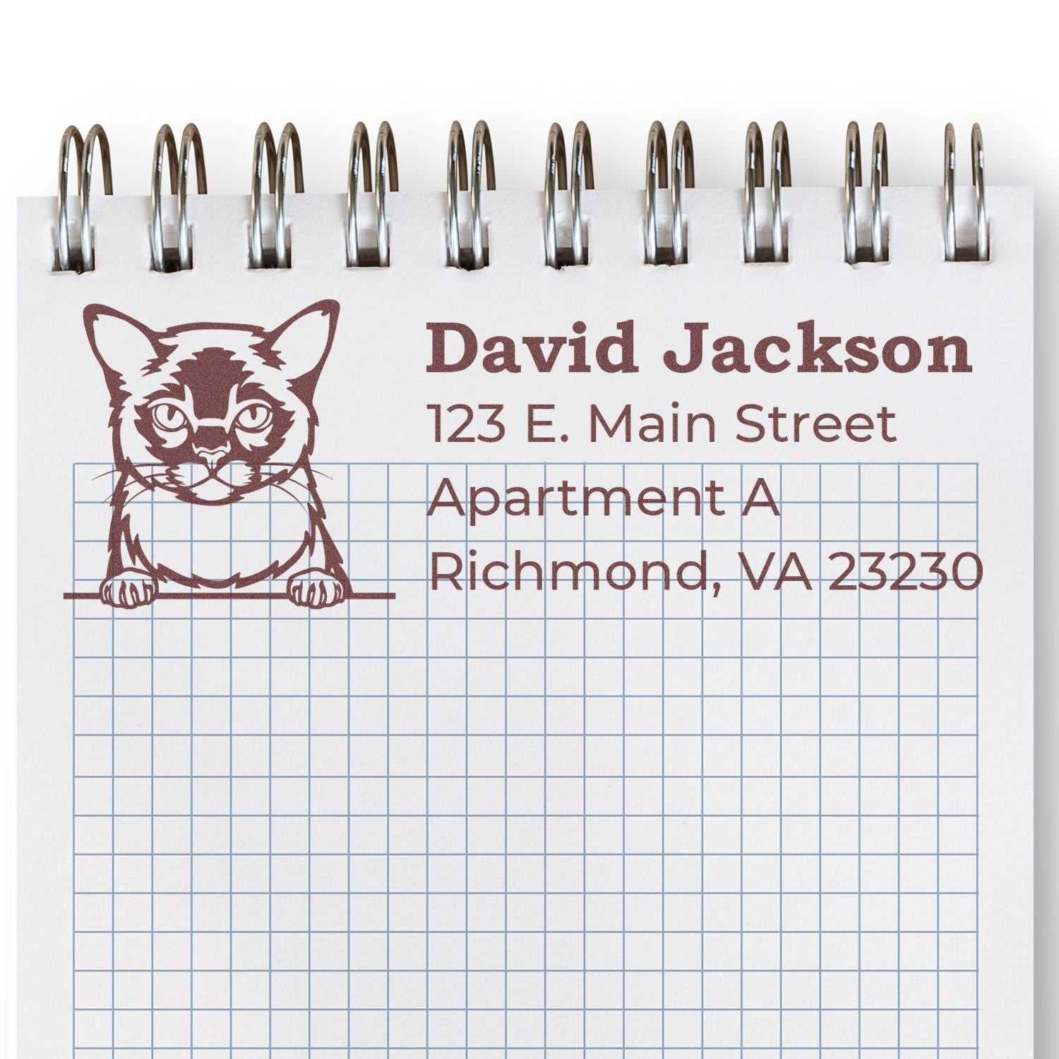 Wood Handle Burmese Cat Address Stamp on notepad with a cute cat illustration and sample address text. Perfect for personalizing mail with a touch of feline charm.