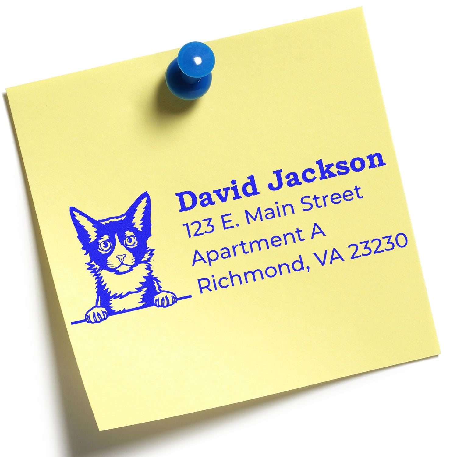 Yellow sticky note with blue text featuring a LaPerm cat illustration. Text includes a sample name and address. Showcases the Slim Pre-Inked LaPerm Peeking Cat Return Address Stamp.