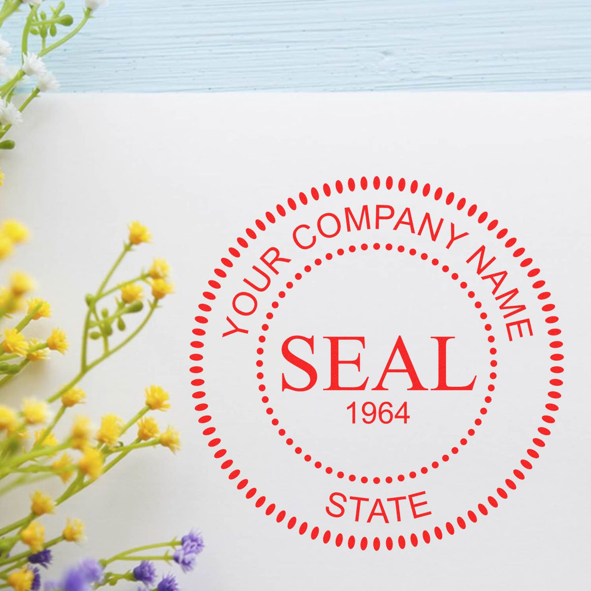 Red custom company seal stamp with circular dotted border, 1964 text, on white background with yellow and purple flowers.