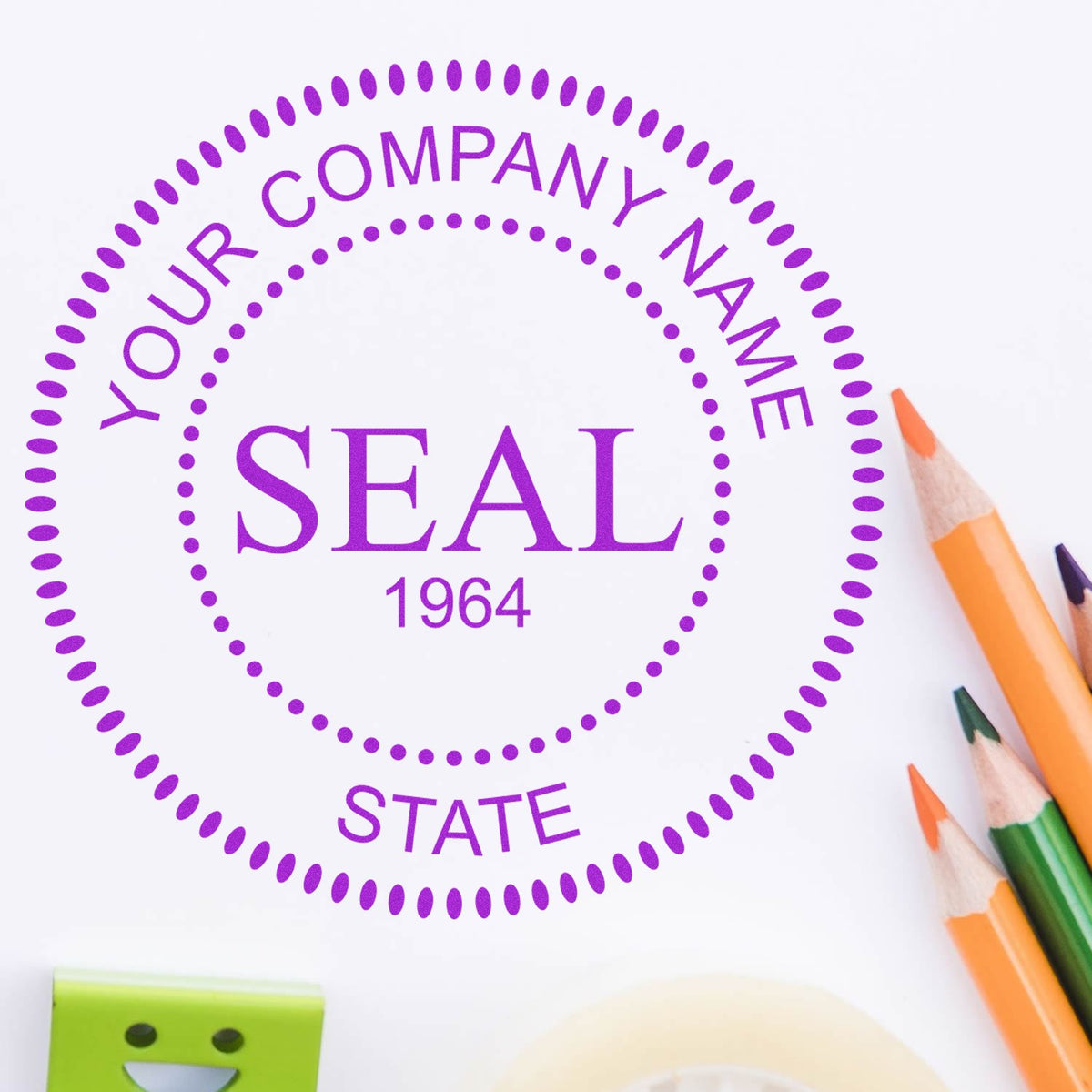 Purple stamp seal design with dotted circle, YOUR COMPANY NAME, SEAL, and 1964 on white paper, beside colored pencils.