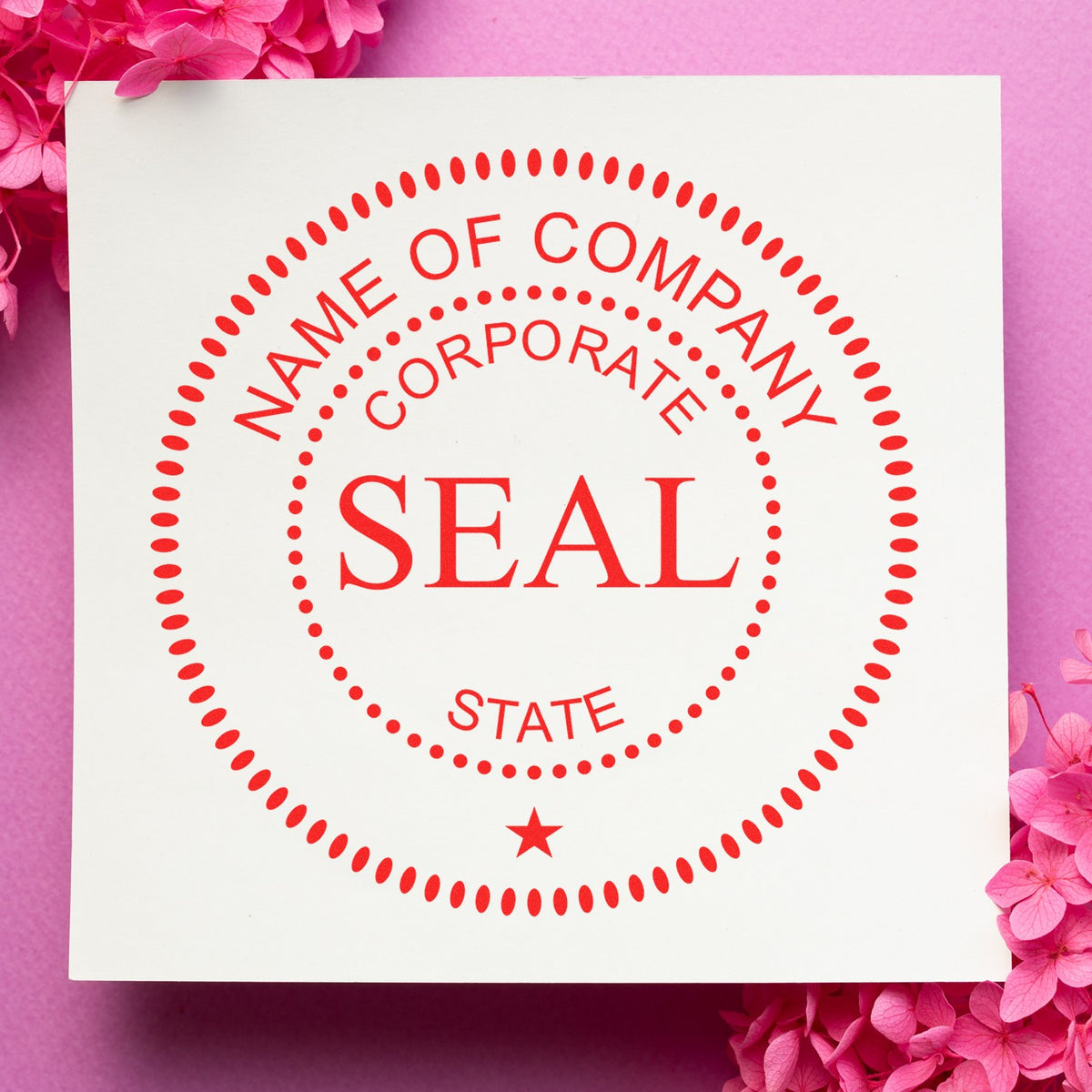 White corporate seal stamp with red circular text and star on a pink floral background.