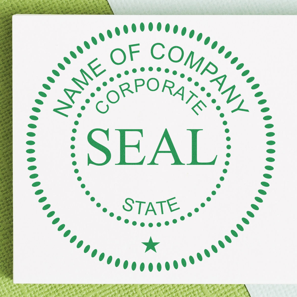 Green corporate seal stamp with dotted border, star, and Name of Company text on white card
