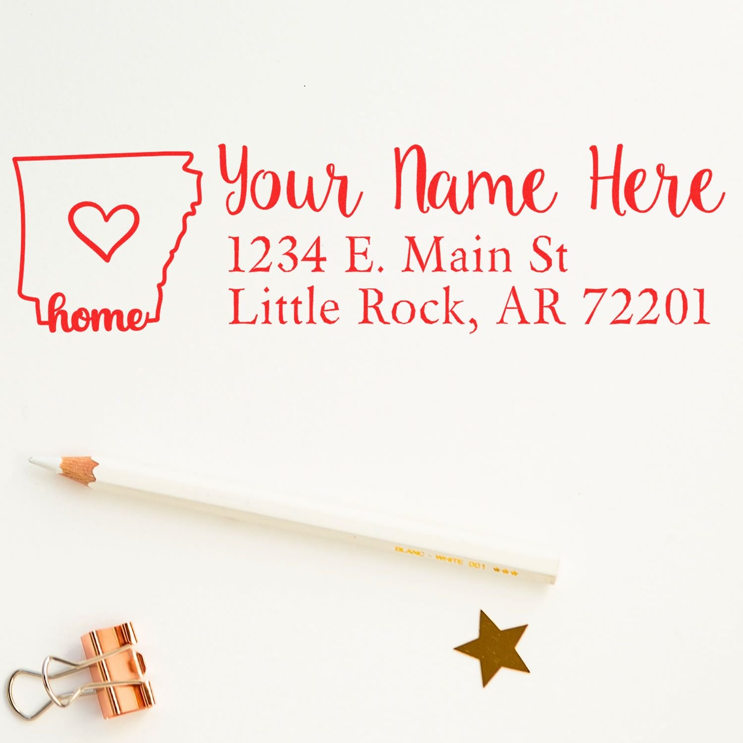 PSI Pre-Inked Personalized Arkansas State Love Address Stamp with red ink, featuring a heart inside the state outline, customizable text, and a pencil nearby on a white background.