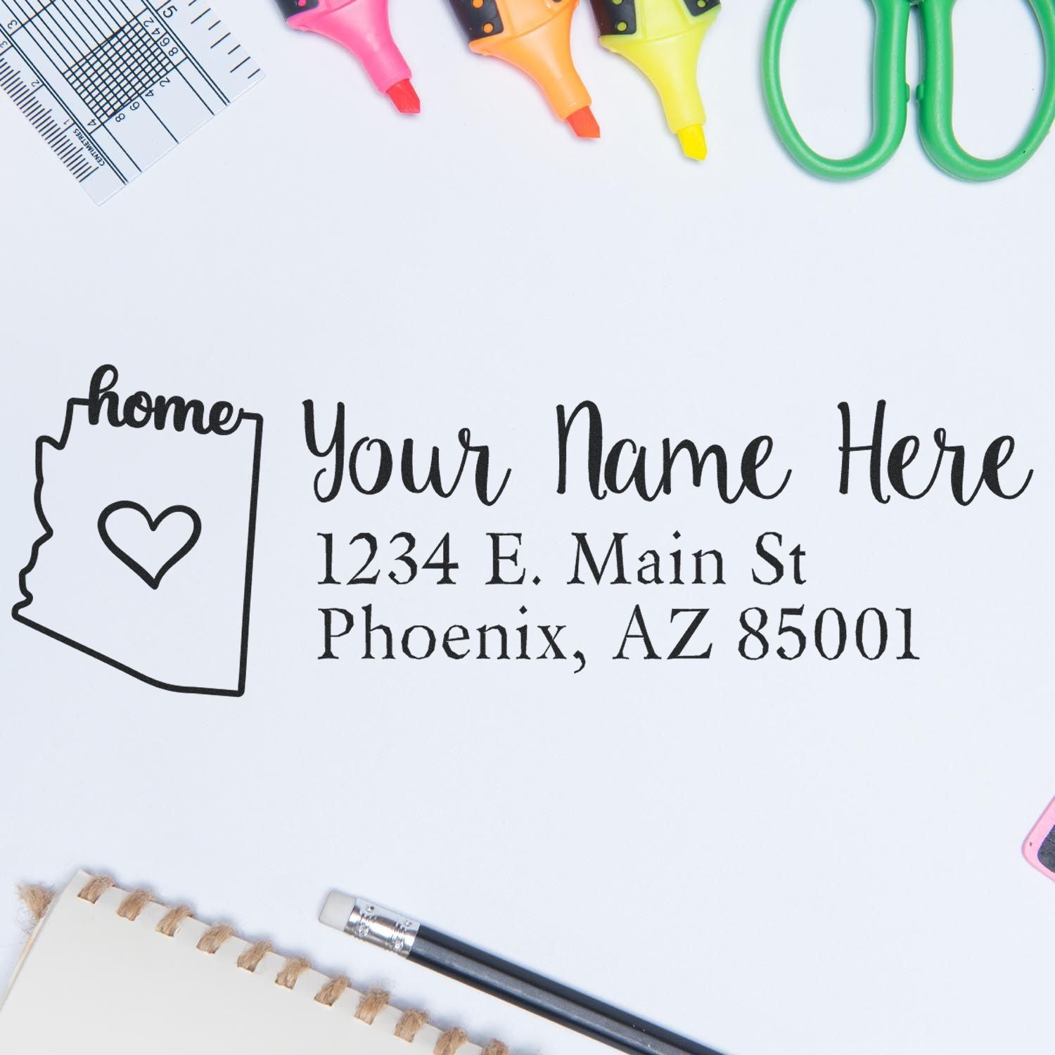 Wood Handle Arizona Custom Address Rubber Stamp on a desk with stationery, featuring a heart inside the state outline and sample address text.