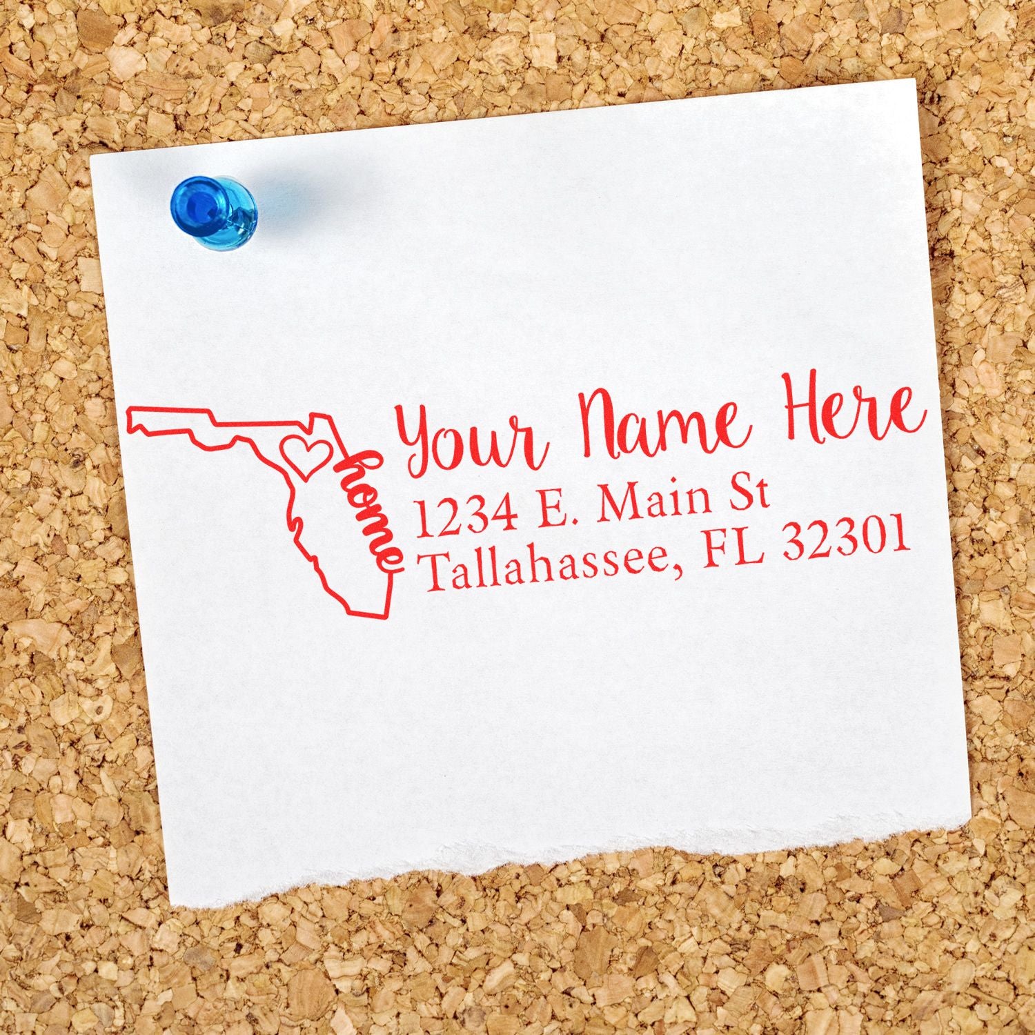 PSI Pre-Inked Personalized Florida State Love Address Stamp on a corkboard, featuring a red outline of Florida with a heart and the word home, next to a customizable address in elegant script.