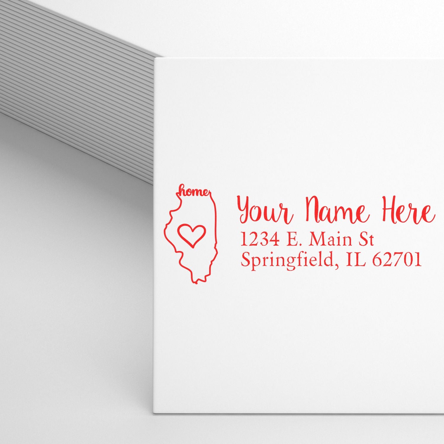 Envelope stamped with the Illinois Self-Inking State Love Address Stamp, featuring a red outline of Illinois with a heart and personalized address in red text.