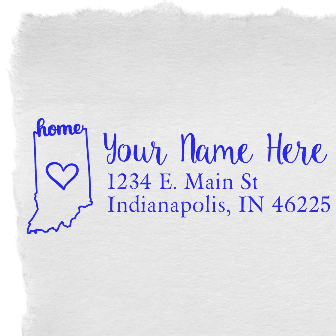 Slim Pre-Inked Indiana State Love Custom Address Stamp on white paper, featuring a blue outline of Indiana with a heart and sample address text in elegant font.