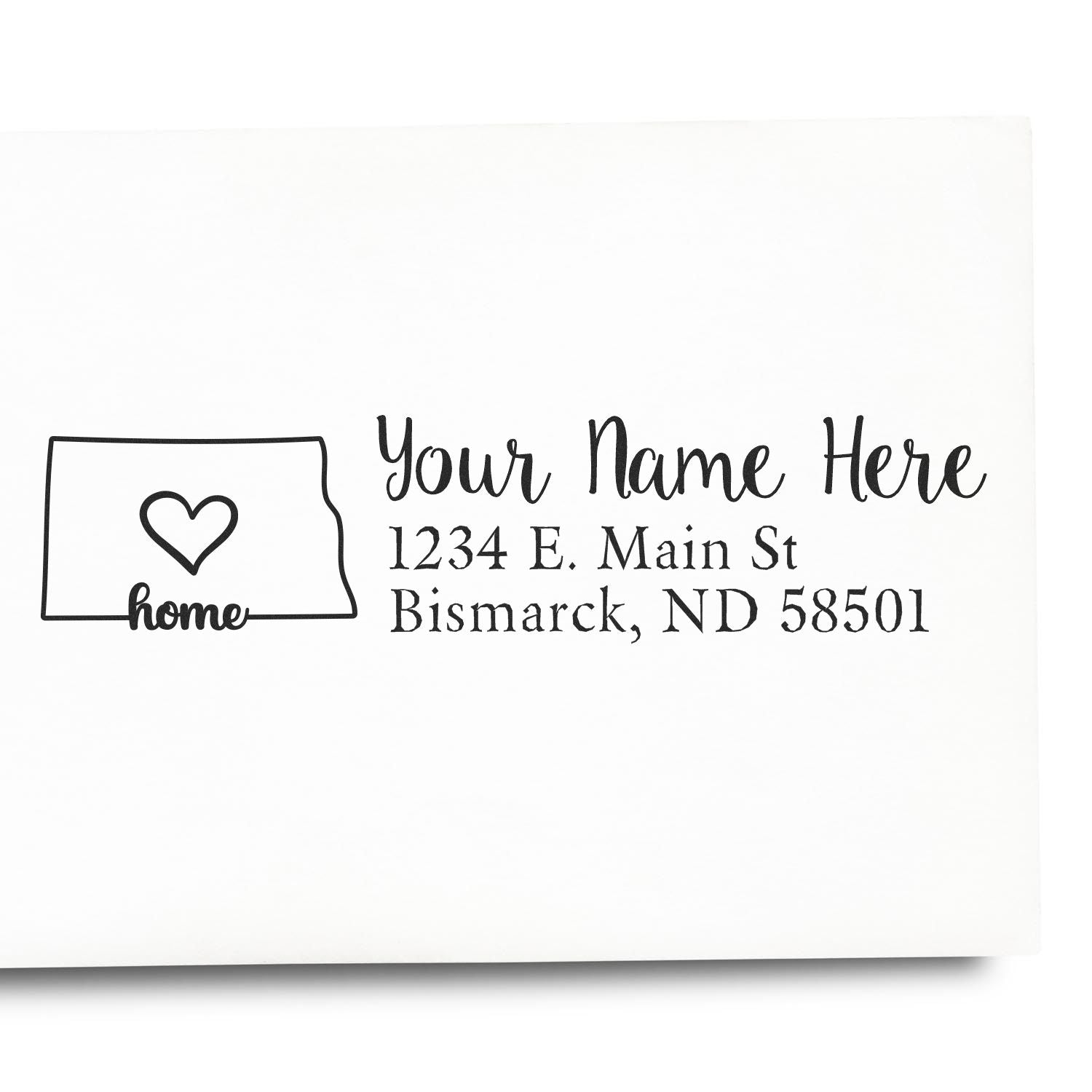 North Dakota Self-Inking State Love Address Stamp on white paper, featuring a heart inside the state outline and customizable address text in elegant script.