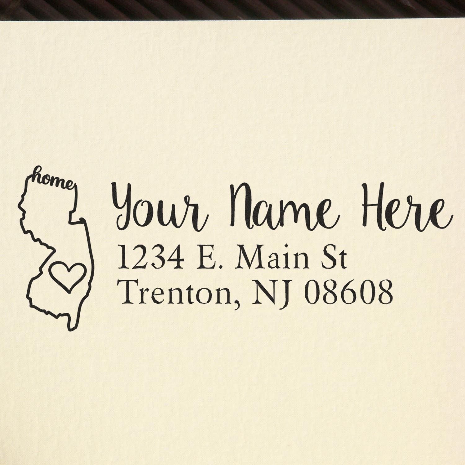 PSI Pre-Inked Personalized New Jersey State Love Address Stamp on paper, featuring a heart design within the state outline and customizable text for name and address.