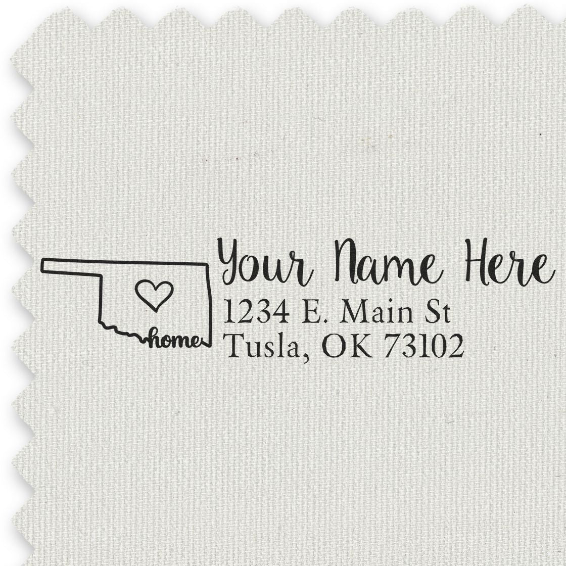 Slim Pre-Inked Oklahoma State Love Custom Address Stamp on fabric, featuring a heart inside the state outline with home text, personalized with name and address in elegant script.