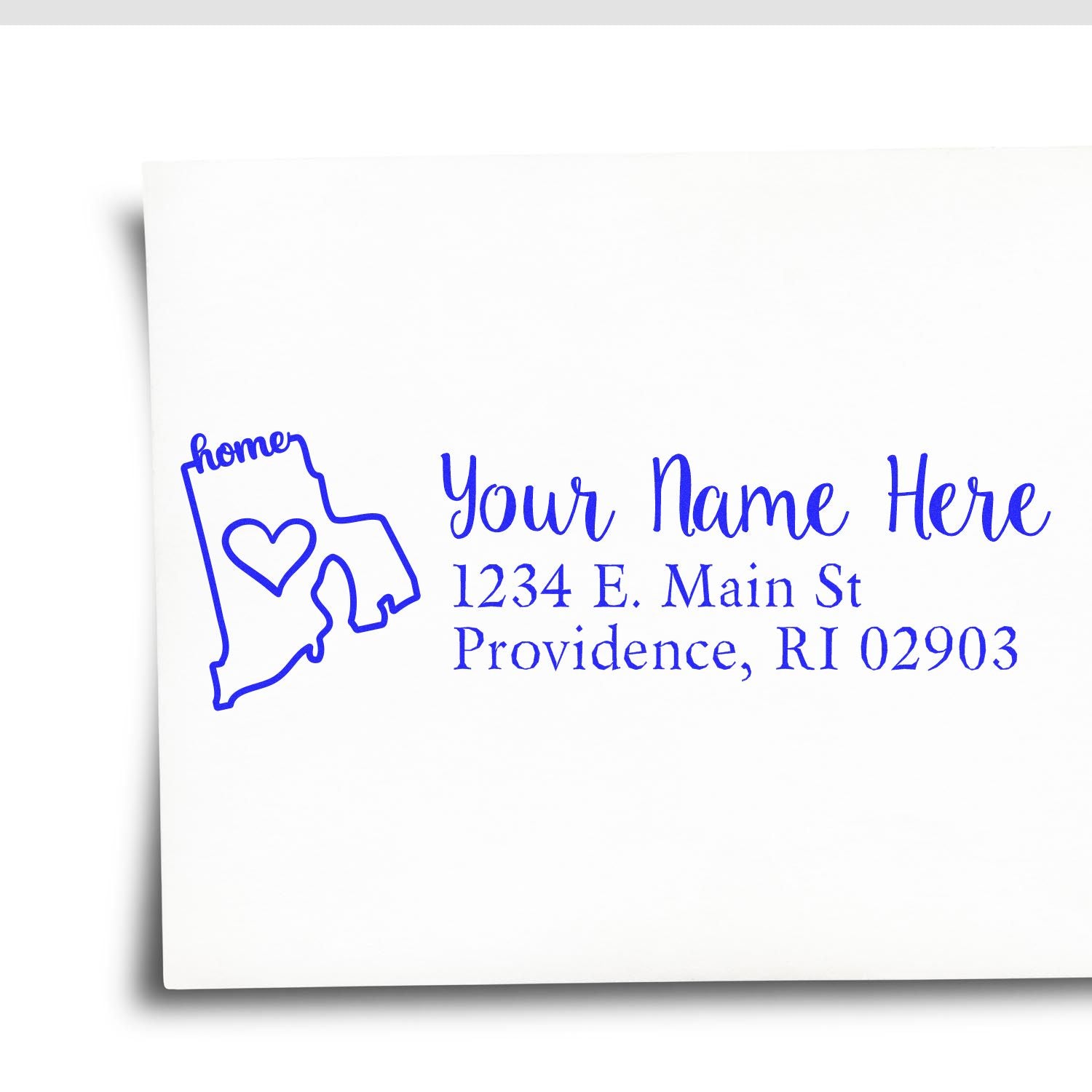 PSI Pre-Inked Personalized Rhode Island State Love Address Stamp on white paper, featuring a blue outline of Rhode Island with a heart and the word home, alongside customizable address text.