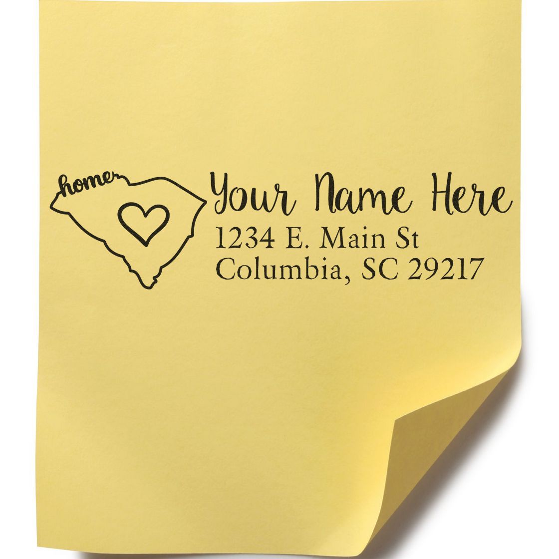 Wood Handle South Carolina Custom Address Rubber Stamp on yellow paper, featuring a heart inside the state outline with customizable name and address text.