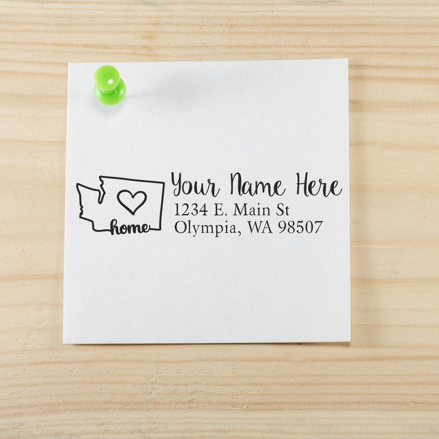 Washington Self-Inking State Love Address Stamp on a note with a green pushpin, featuring a heart inside the state outline and sample address text.