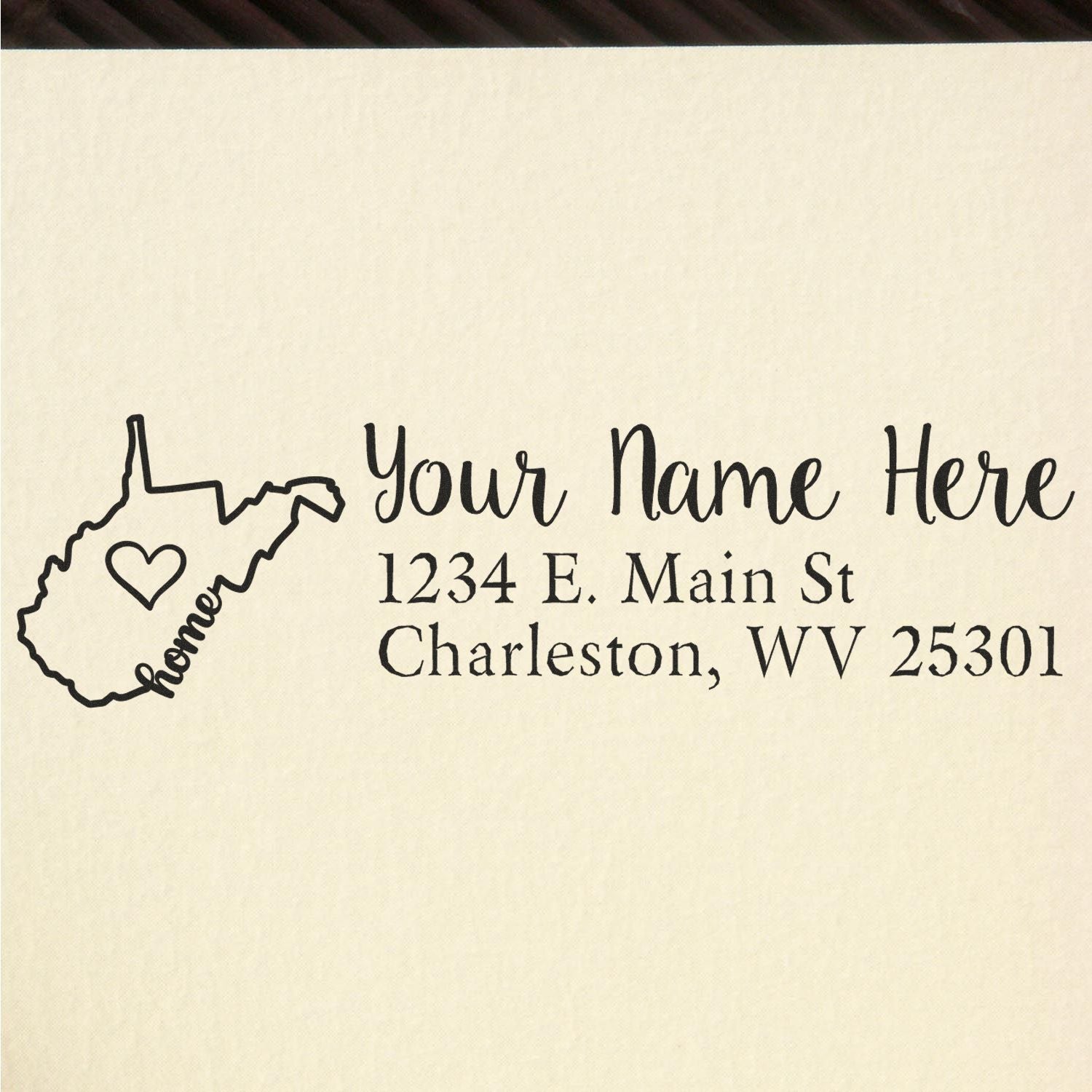 PSI Pre-Inked Personalized West Virginia State Love Address Stamp on paper, featuring a heart design within the state outline and customizable text for name and address.