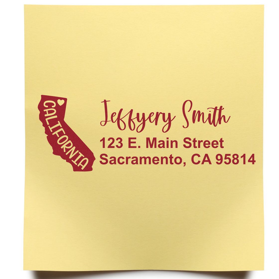 Yellow paper with California State Love Personalized Address Stamp featuring a red California outline, heart, and custom address: Jeffery Smith, 123 E. Main Street, Sacramento, CA 95814.