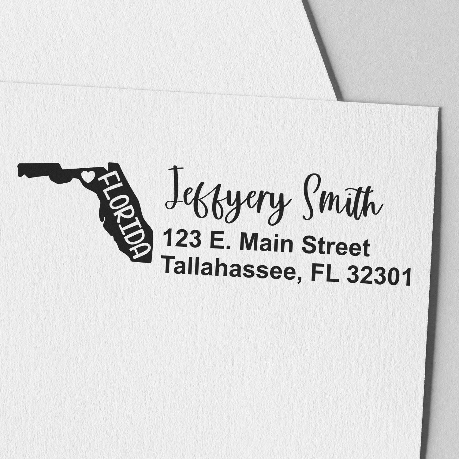 State Love of Florida Custom Address Stamp Self-Inking on white paper, featuring a Florida map design with heart and personalized address in elegant script.