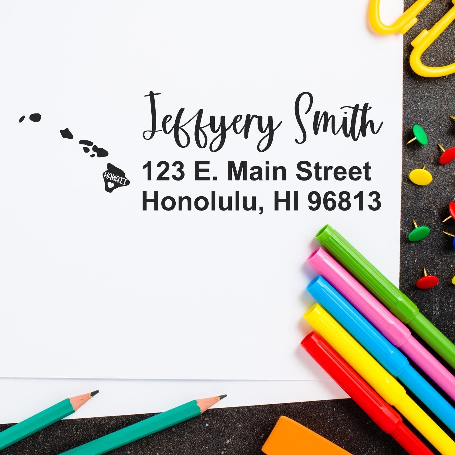 Hawaii State Love Personalized Address Stamp on white paper with colorful pens and paperclips. Features a map of Hawaii and custom address text in elegant font.