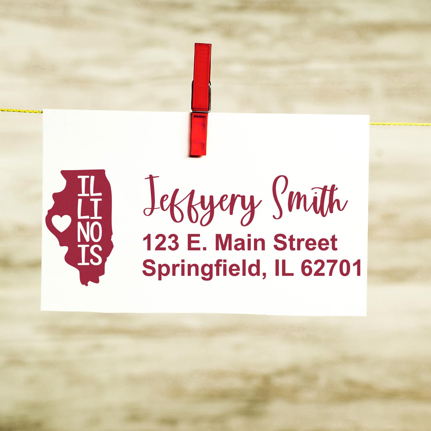 Illinois State Love Personalized Address Stamp on a card with 'Jeffery Smith, 123 E. Main Street, Springfield, IL 62701' in red, featuring an Illinois state outline with a heart.