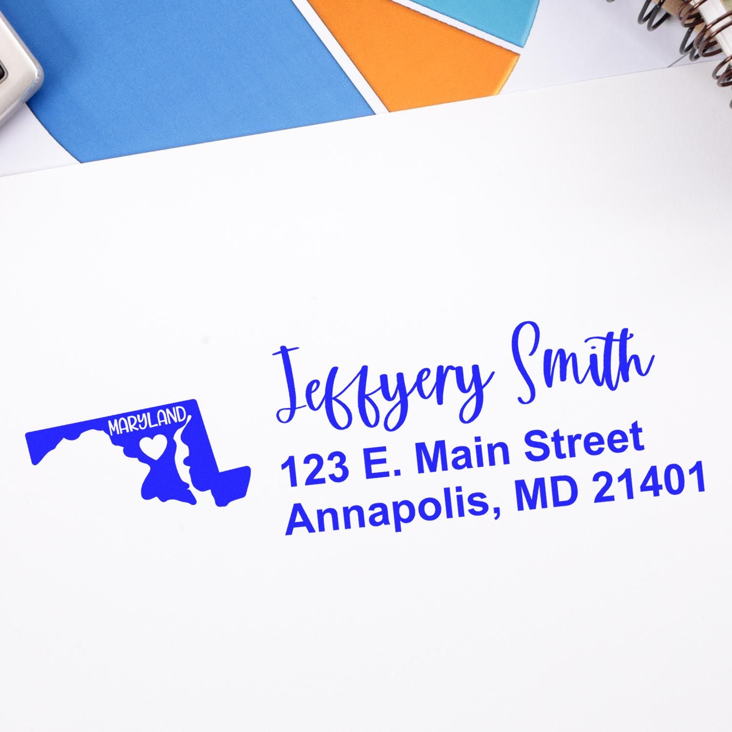 Maryland State Love Personalized Address Stamp in blue ink on white paper, featuring a heart design within the state outline, with the name Jeffery Smith and an address in Annapolis, MD.