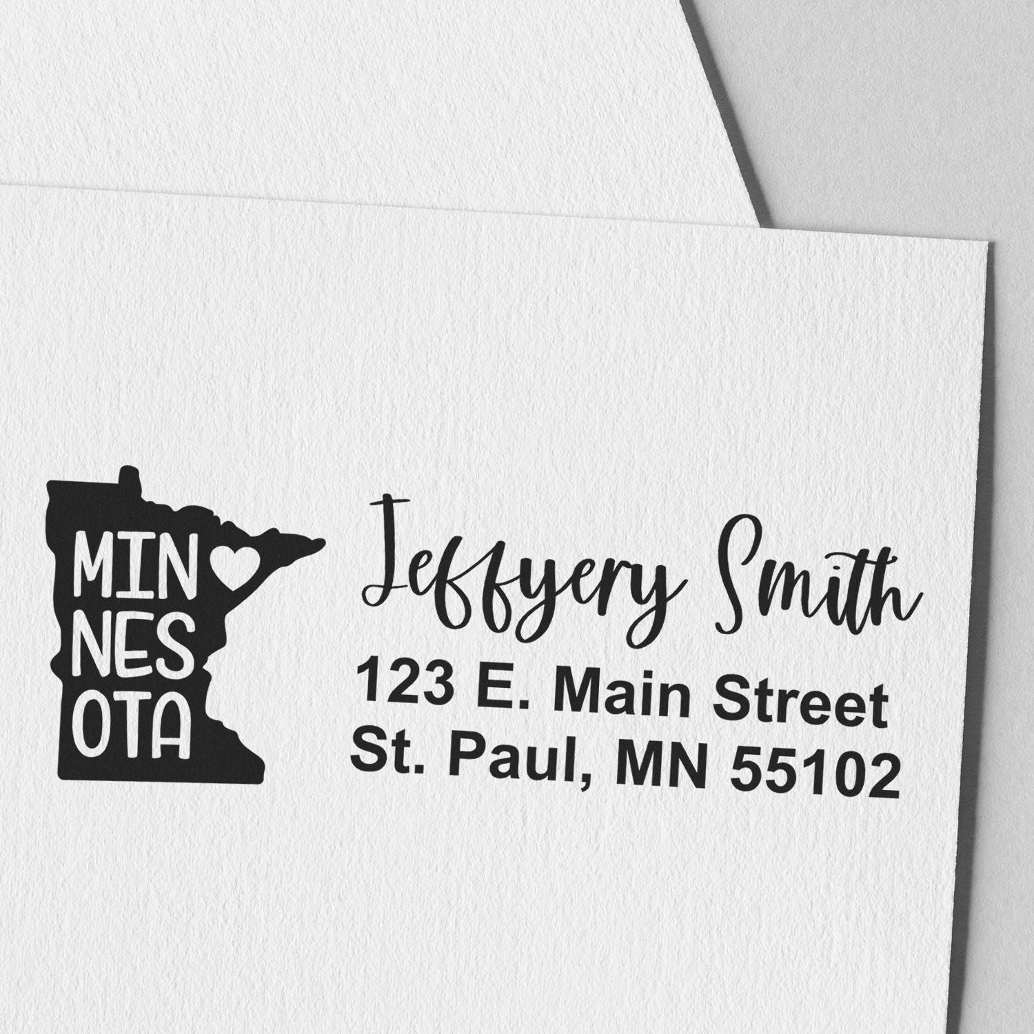 State Love of Minnesota Custom Address Stamp Self-Inking on white paper, featuring a Minnesota state outline with heart and personalized address in elegant font.