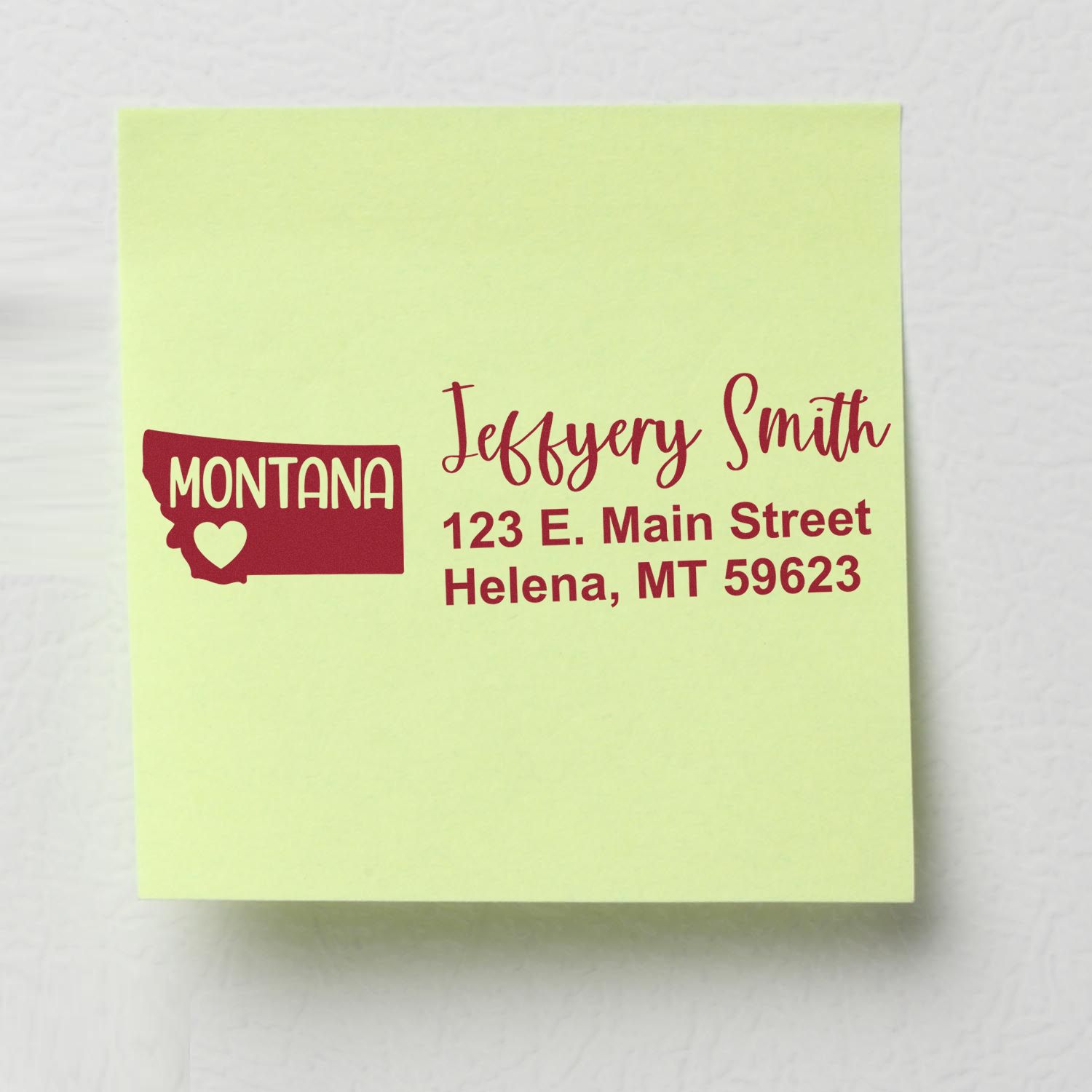 A green sticky note displays the Montana State Love Personalized Address Stamp with a red outline of Montana, a heart, and the address: Jeffery Smith, 123 E. Main Street, Helena, MT 59623.