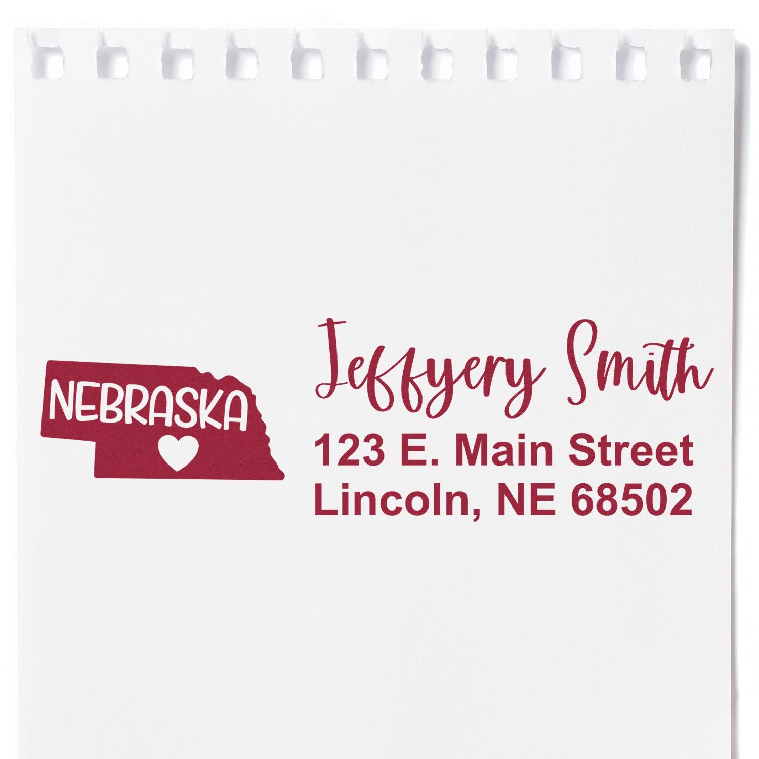 Nebraska State Love Personalized Address Stamp on white paper, featuring a Nebraska state outline with a heart and custom address in red text.