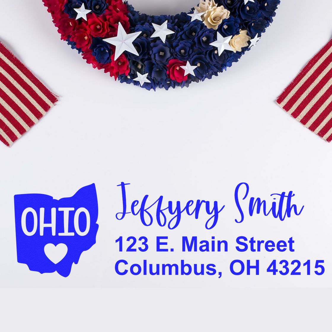 Ohio State Love Personalized Address Stamp on a white background with a patriotic wreath and striped fabric. Displays the name Jeffery Smith and an address in blue text with an Ohio state outline.