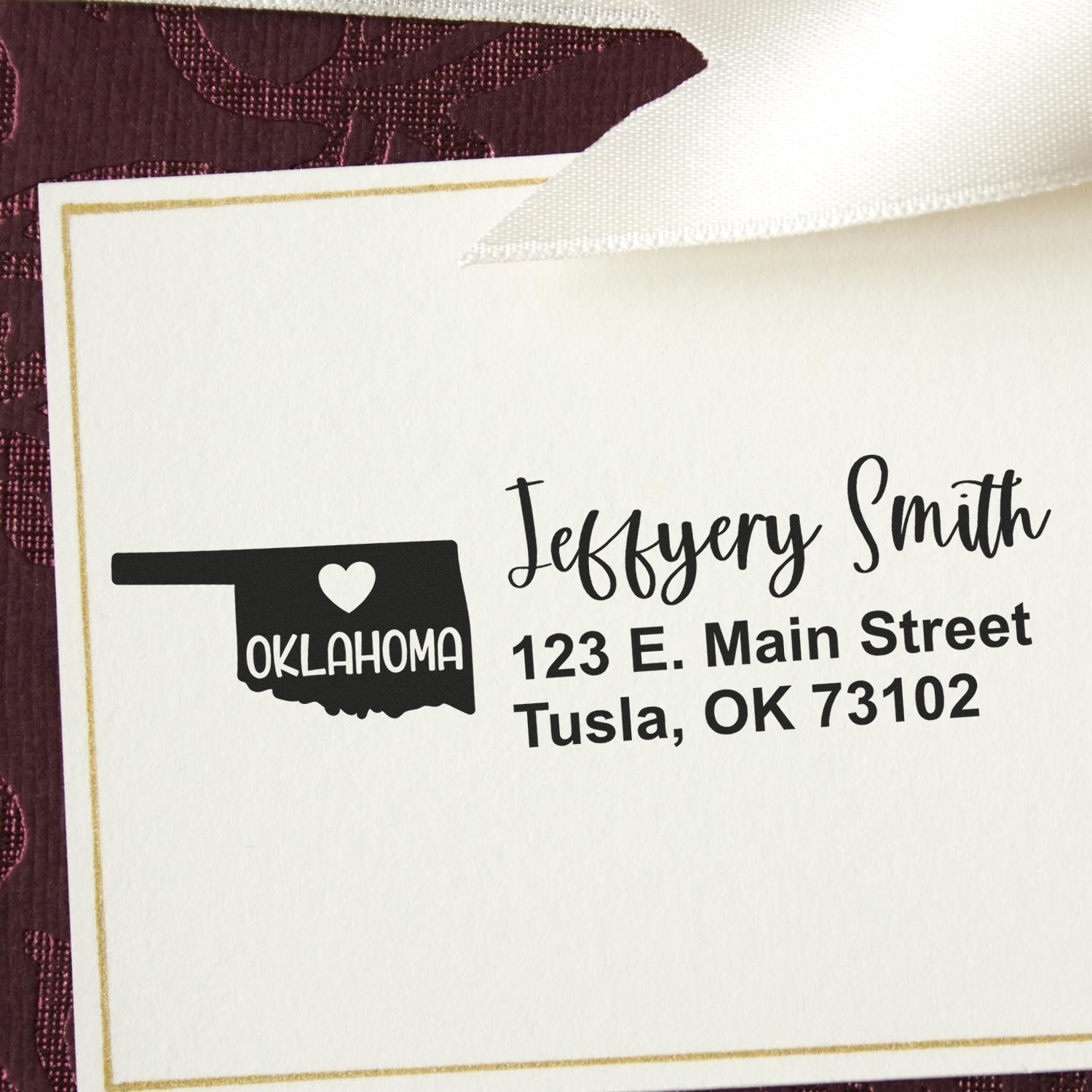 Oklahoma State Love Personalized Address Stamp on an envelope, featuring a heart within the state outline and elegant script for the name and address.