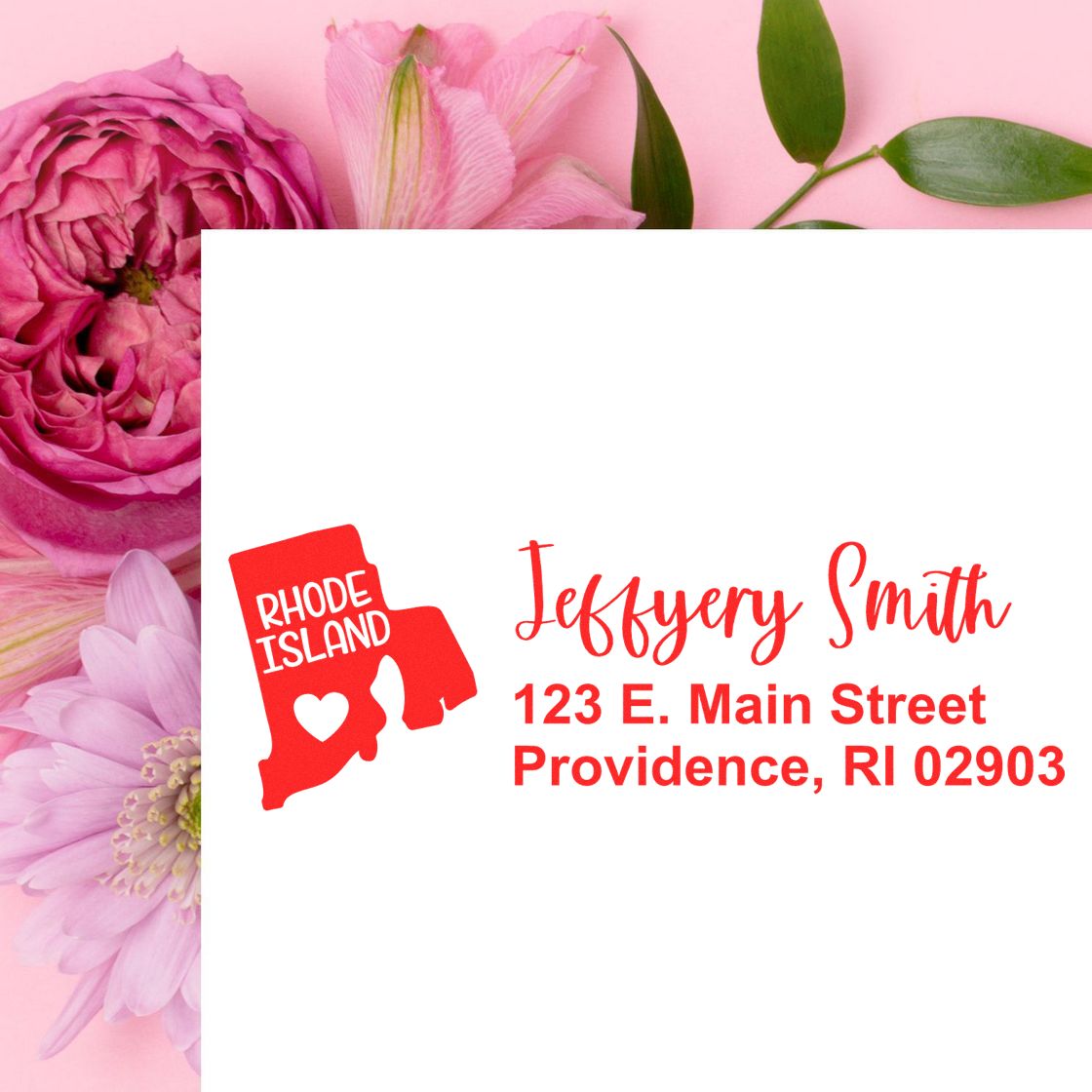 PSI Pre-Inked Rhode Island State Love Customized Address Stamp on white paper with pink flowers. Displays 'Rhode Island' map and address in red ink. Perfect for personalized mailings.