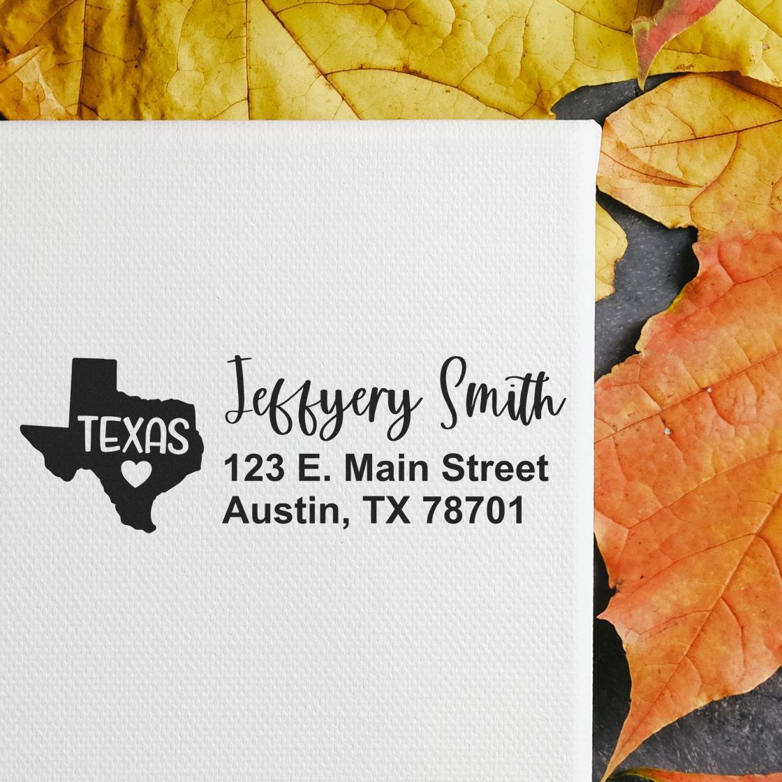 State Love of Texas Custom Address Stamp Self-Inking on white paper, featuring a Texas outline with heart, surrounded by autumn leaves.